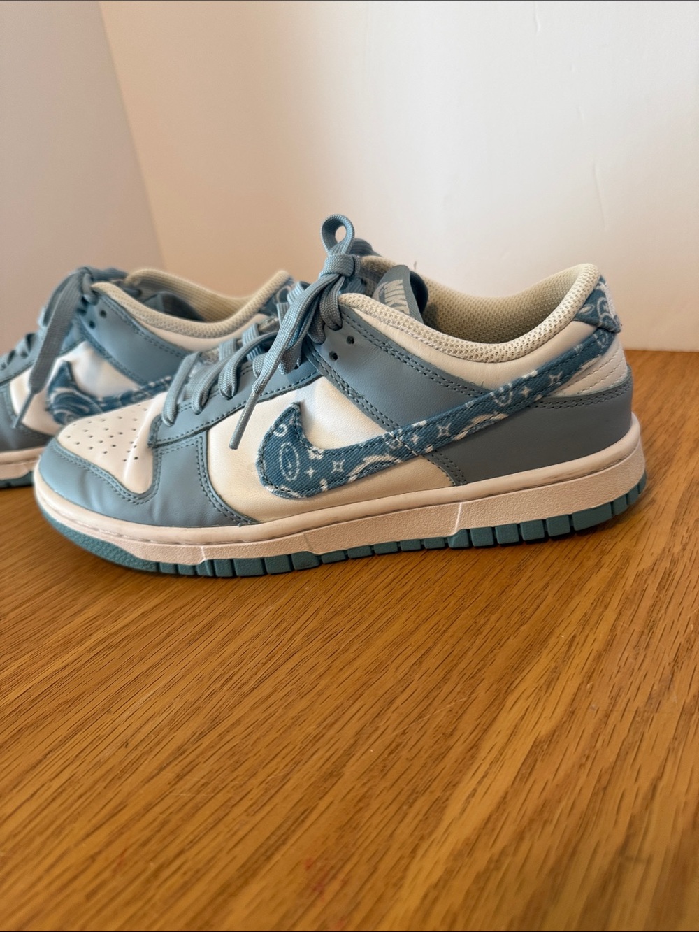 Nike Light Blue & White Low-Top Sneakers with Patterned Swoosh